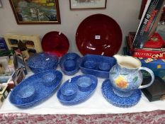 A quantity of blue ceramic ware including ramekins & 2 plastic plates/dish