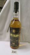 A bottle Spey Burn Highland malt Scotch whisky.