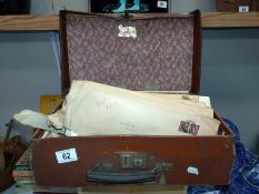 A vintage case full of old invoices (ephemera) etc