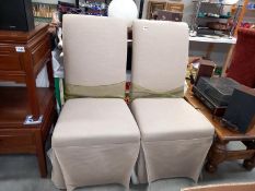 A pair of dining room chairs with covers COLLECT ONLY