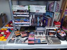 A good selection of DVD's, PS3 games, music cassette tapes, cd's, Elvis single, book, etc