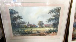 A framed and glazed watercolour rural scene, signed but indistinct. 73 x 57 cm. COLLECT ONLY.