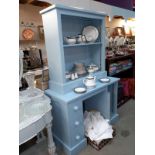 A blue painted pine desk. (110cm x 51cm x Height 77cm). Shelf brackets missing from shelves. Plus
