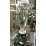 A silver snooker trophy on base, total height 35 cm. trophy 26 cm.