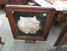 A mahogany firescreen with 'silk' tiger's head, COLLECT ONLY.