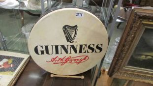 A large Irish made 'Guinness' drum in box.