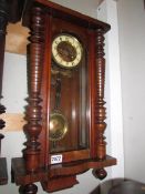 A mahogany Vienna wall clock in working order, COLLECT ONLY. Missing top,