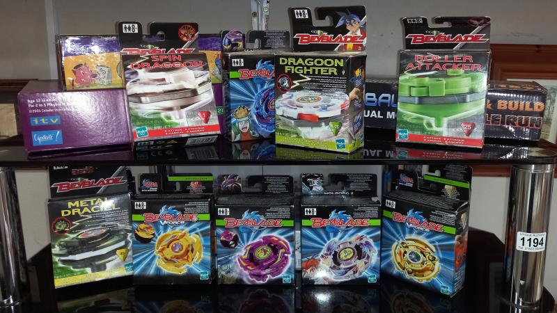 A quantity of boxed Begblade Dragoon fighters etc. (2 shelves)