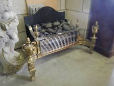 A good quality heavy brass and metal period style electric fire, approximately 90cm wide x 48 cm dp.