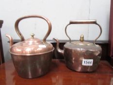 Two copper kettles.