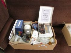 A box of haberdashery including vintage knitting patternsm knitting needles, fabrics, buttons,