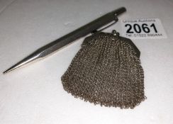 A silver mesh sovereign purse and a silver propelling pencil.