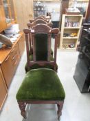 A set of four pillar back and carved dining chairs with green upholstery, COLLECT ONLY.