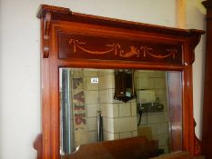 A Victorian mahogany inlaid bevelled glass overmantel mirror. COLLECT ONLY.