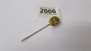 A superb quality antique stick pin (tests as gold, possibly 24k), 2.2 grams.