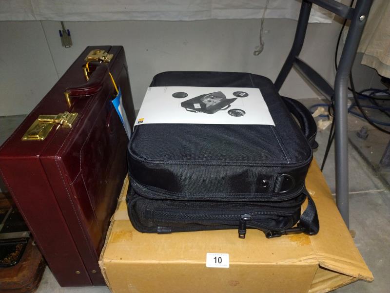 A new briefcase (with original outer box) plus 2 laptop bags