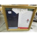 A framed rugby shirt presented by S (Coop) Cooper, 1st April 1995 from RAF Waddington Rugby club,