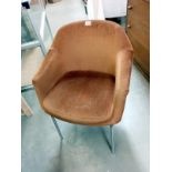 A 1960's/70's gold/orange velour coloured chair