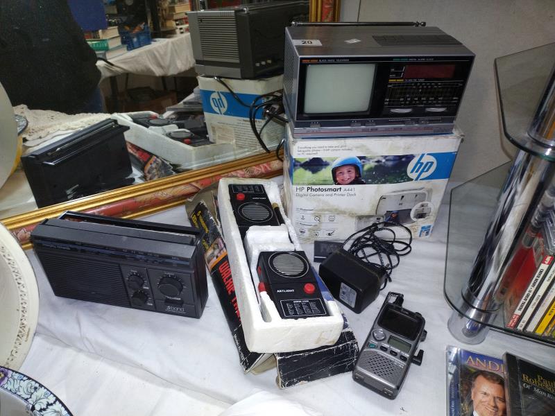 A pair of Artlight walkie talkies, vintage Saisho tv, digital alarm clock etc