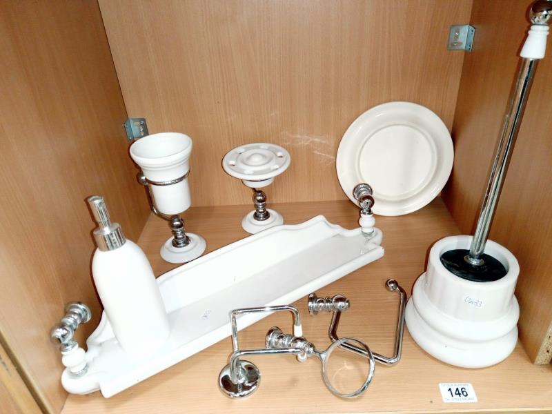 A good lot of ceramic/chrome bathroom items