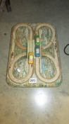 A 1950/60's Western Germany tin plate clockwork roadway with three cars, COLLECT ONLY.