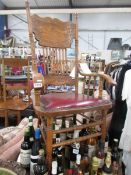 A modern elbow chair with carved wood back, turned wood detail and red leather seat, COLLECT ONLY.