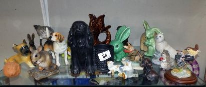 A quantity of animal ornaments including Sylvac rabbits, spaniel planter etc