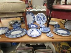 A large lot of blue and white plates, lidded pots, candle holder etc., COLLECT ONLY.