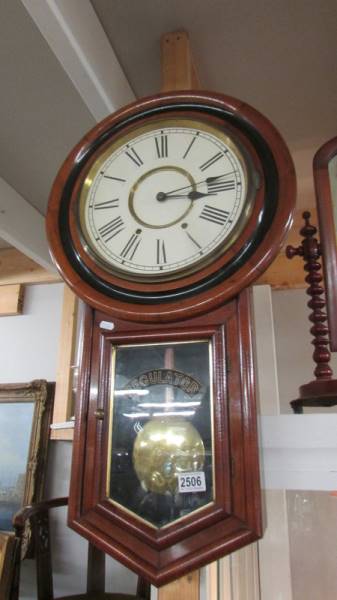 A mahogany drop dial regulator wall clock. COLLECT ONLY.