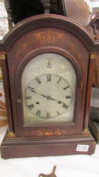 A mahogany inlaid bracket clock. COLLECT ONLY.