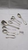 Six various silver teaspoons, a silver cheese scoop and a small silver sugar tongs, 116 grams.