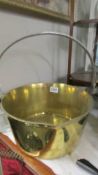 A large brass jam pan.