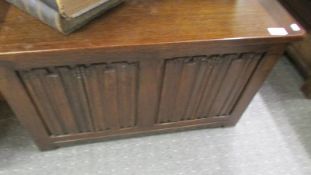 A good clean oak linen box with linenfold panels to front, COLLECT ONLY.