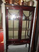 A mahogany astragal glazed cabinet. COLLECT ONLY.