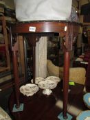 A circular mahogany pad foot occasional table with carved floral details, COLLECT ONLY.