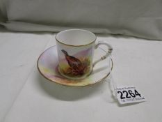 A Royal Worcester James Stinton game birds coffee can and saucer.