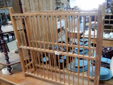 An early 20th century pine plate rack