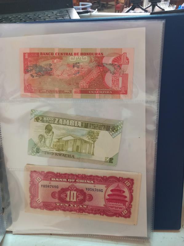 An album of approximately 86 world bank notes. - Image 20 of 26