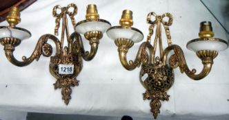 A pair of gilded wall lights. Collect Only.