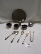 A collection of silver condiments, a silver dish, silver spoons etc.,