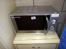 A Russell Hobbs 700 watt microwave (model RHM1709-G)