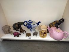 A shelf of elephants etc.