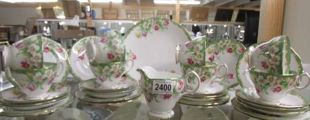 In excess of 30 pieces of Bell fine bone china Narcissus pattern tea ware. COLLECT ONLY.