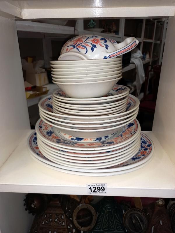 A quantity of dinnerware