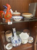 A selection of decorative ceramic plates, bowls, jars etc (2 shelves)