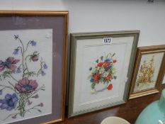 A quantity of framed and glazed embroideries.