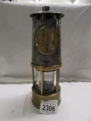 An Eccles Protector Lamp Lighting Co., Ltd Davy Lamp, No. 55/2496G.