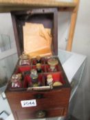 A 19th century chemistry/soil testing fit in fitted mahogany box with glass bottles & instructions.