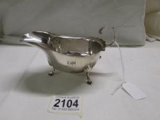 A hall marked silver sauce boat, 98 grams.