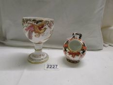 A Royal Crown Derby 'Olde Avesbury' goblet and a Royal Crown Derby salt.
